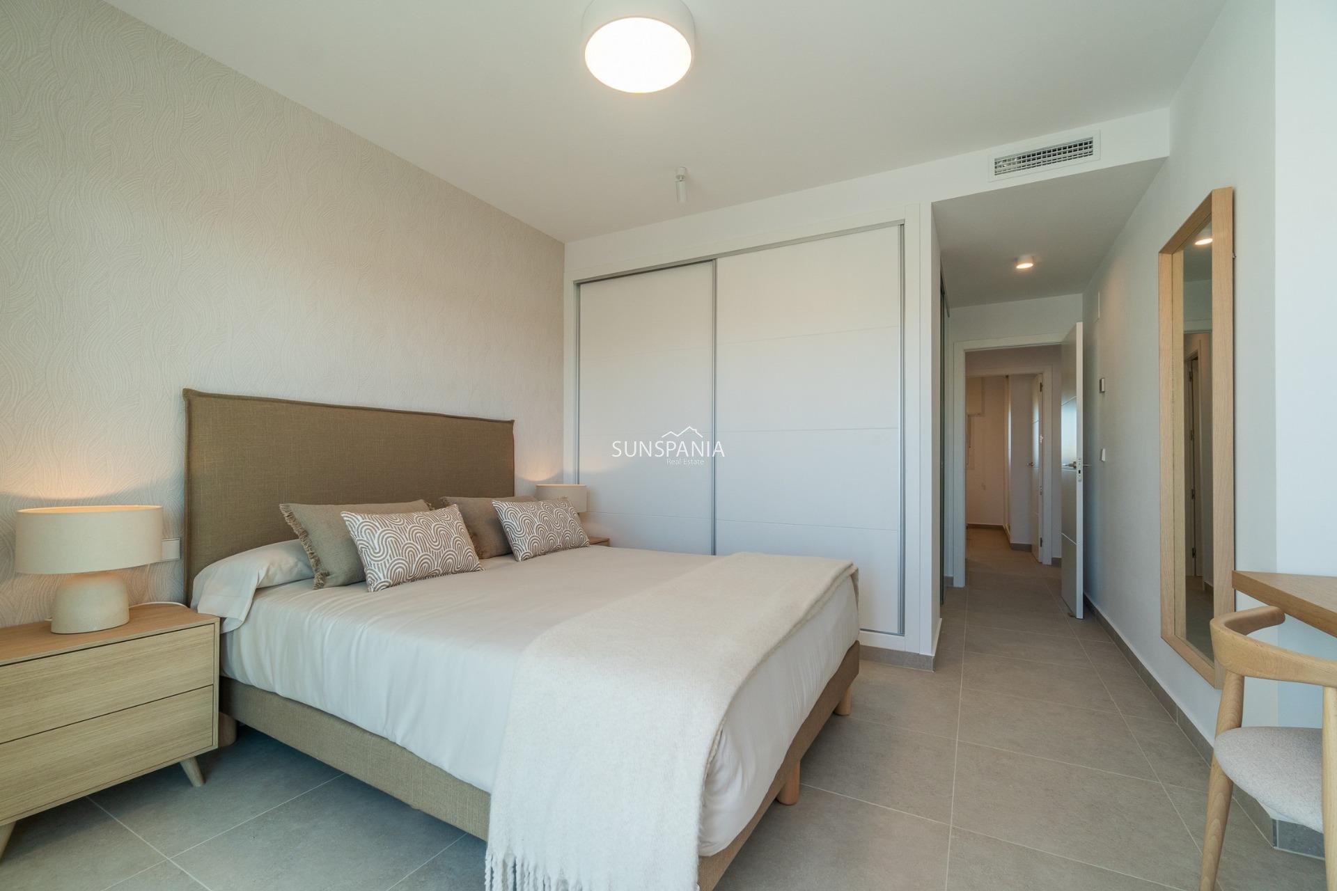 Obra nueva - Piso -
Orihuela Costa - Playa Flamenca