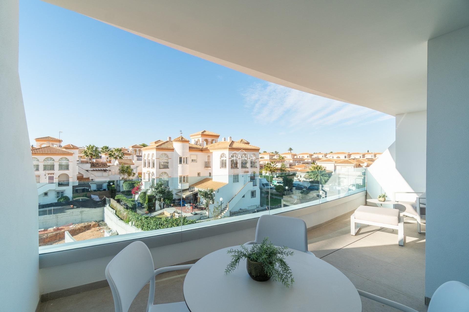 Obra nueva - Piso -
Orihuela Costa - Playa Flamenca