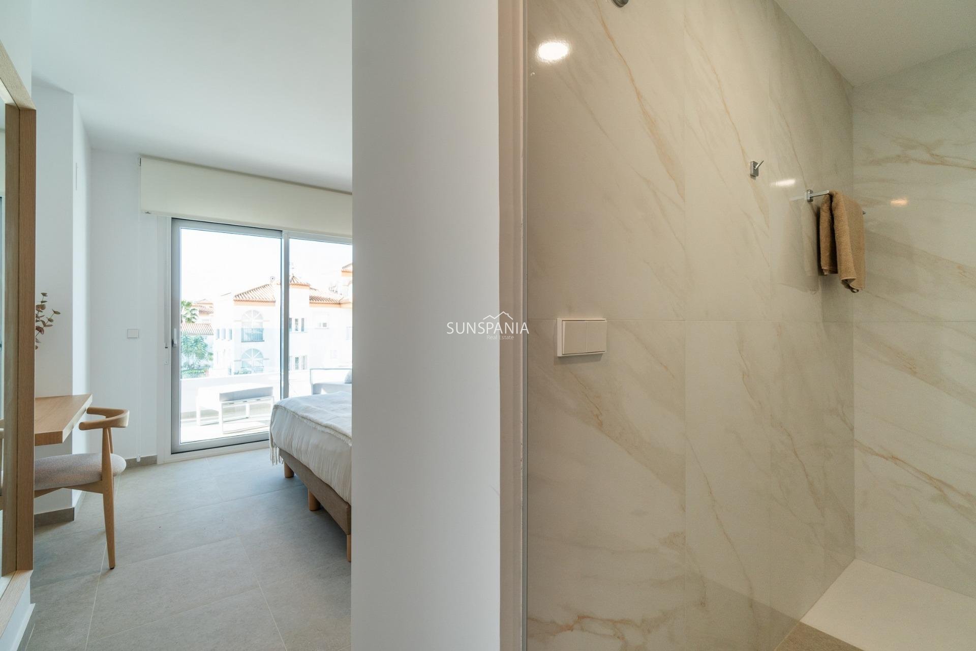 Obra nueva - Piso -
Orihuela Costa - Playa Flamenca