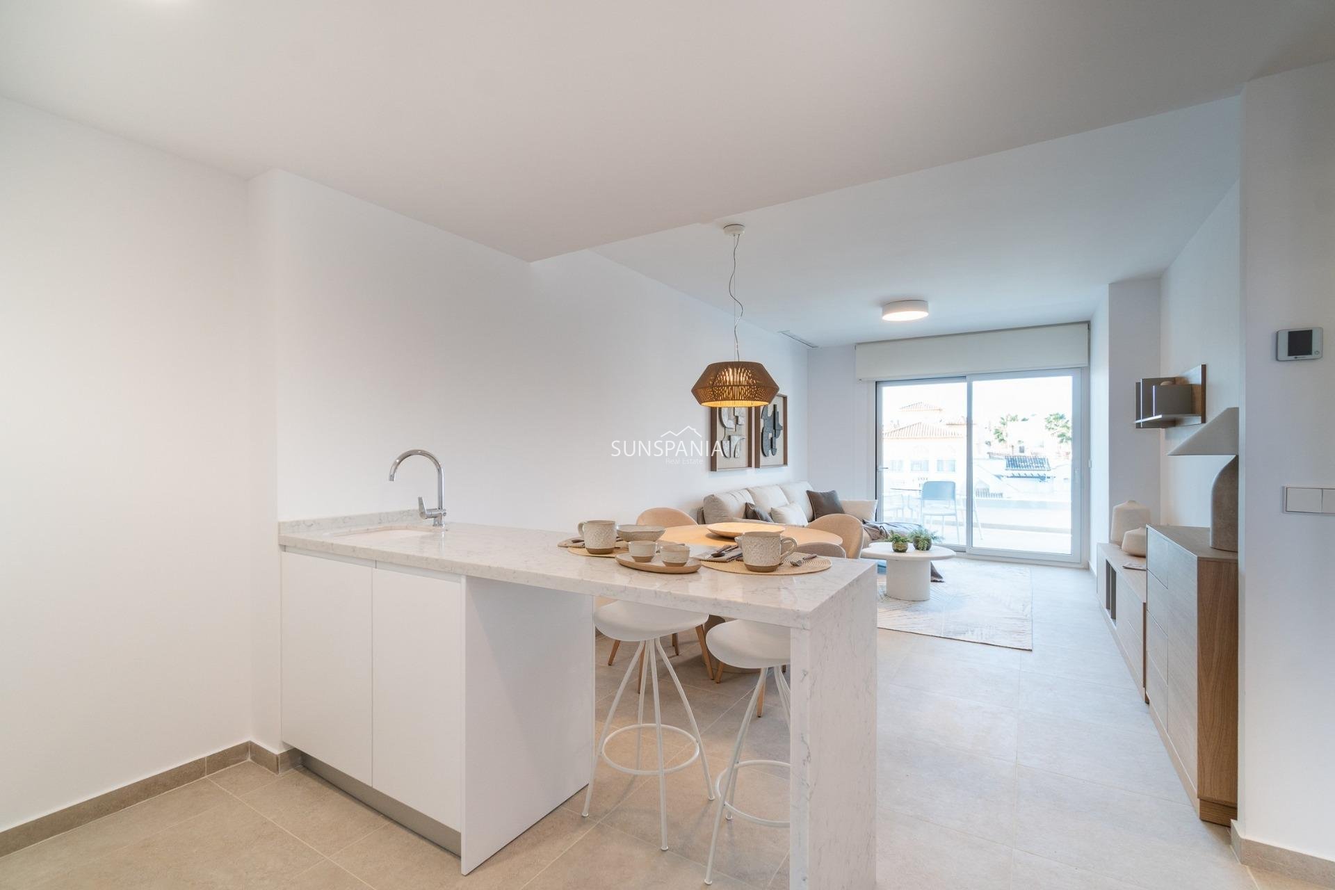 Obra nueva - Piso -
Orihuela Costa - Playa Flamenca