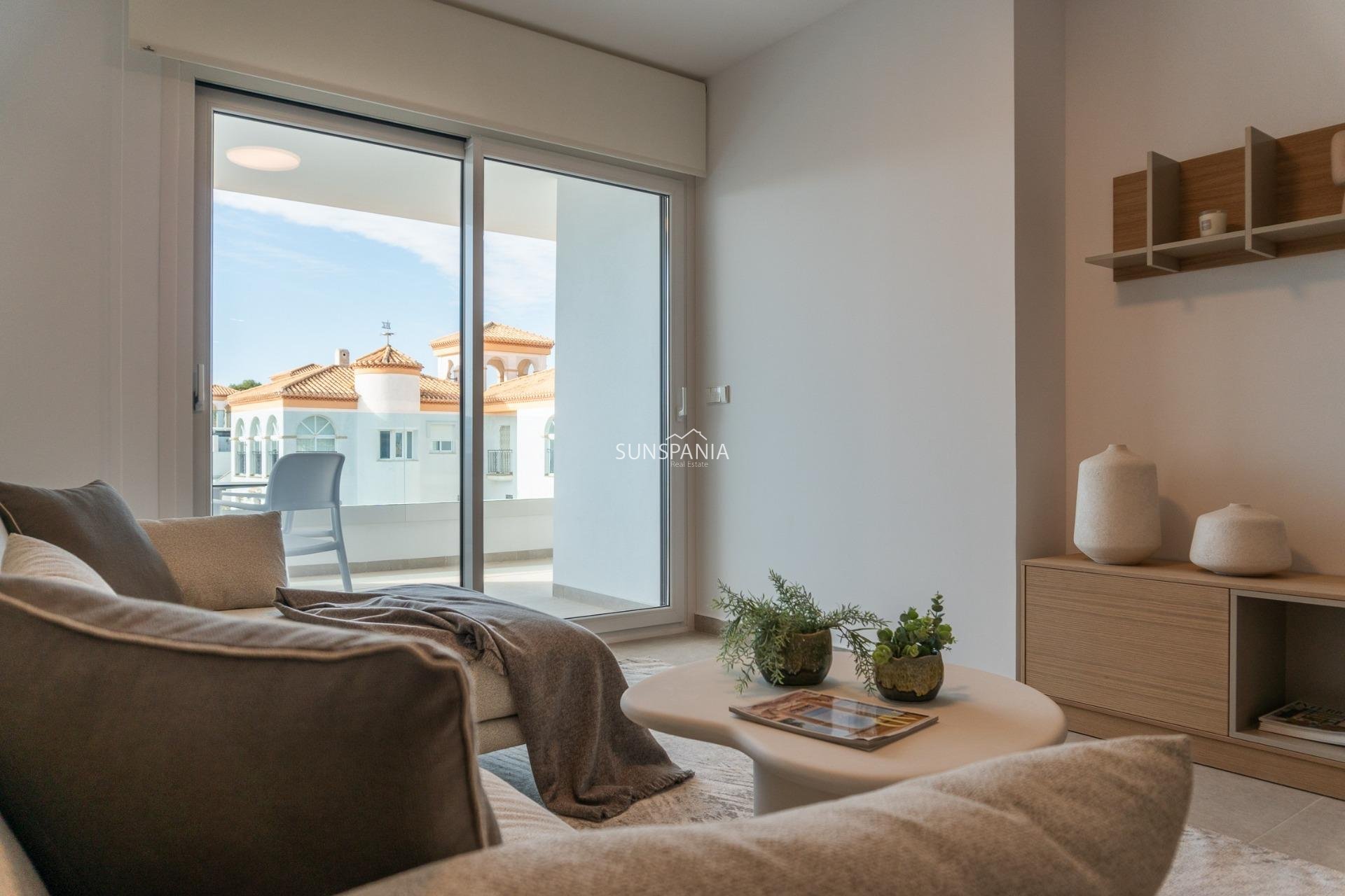 Obra nueva - Piso -
Orihuela Costa - Playa Flamenca