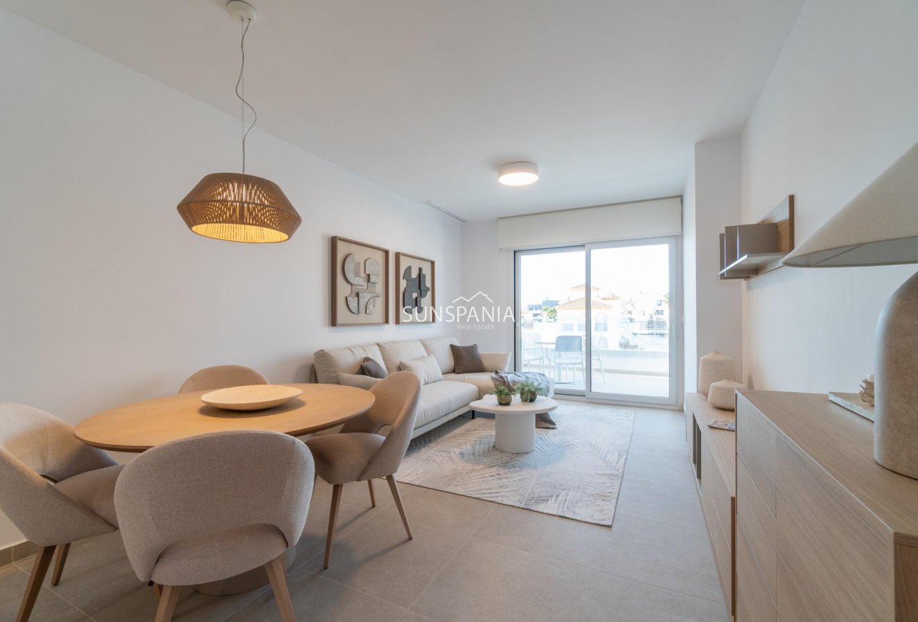 Obra nueva - Piso -
Orihuela Costa - Playa Flamenca