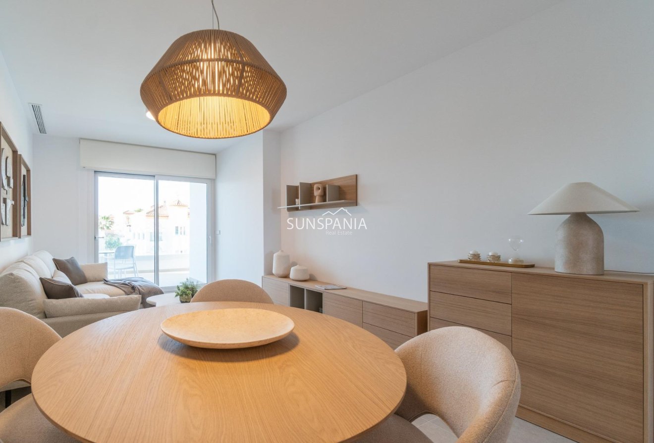 Obra nueva - Piso -
Orihuela Costa - Playa Flamenca