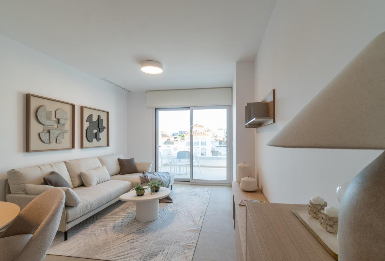 Obra nueva - Piso -
Orihuela Costa - Playa Flamenca