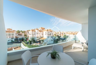 Obra nueva - Piso -
Orihuela Costa - Playa Flamenca