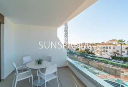Obra nueva - Piso -
Orihuela Costa - Playa Flamenca