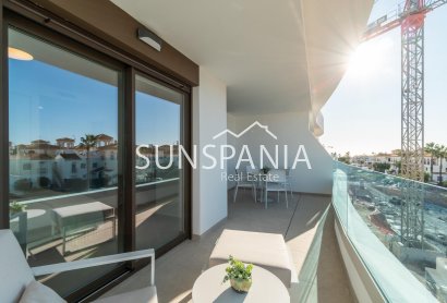 Obra nueva - Piso -
Orihuela Costa - Playa Flamenca