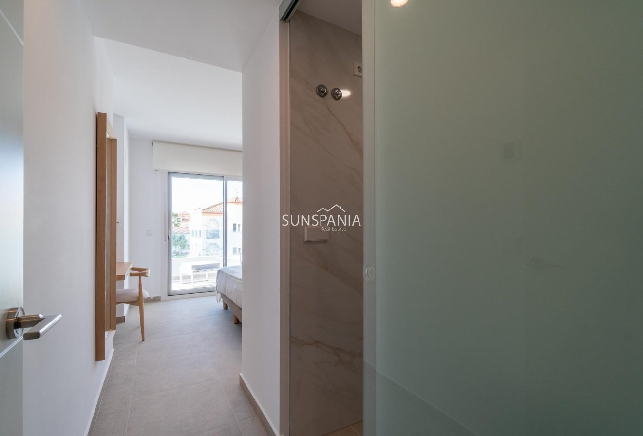 Obra nueva - Piso -
Orihuela Costa - Playa Flamenca