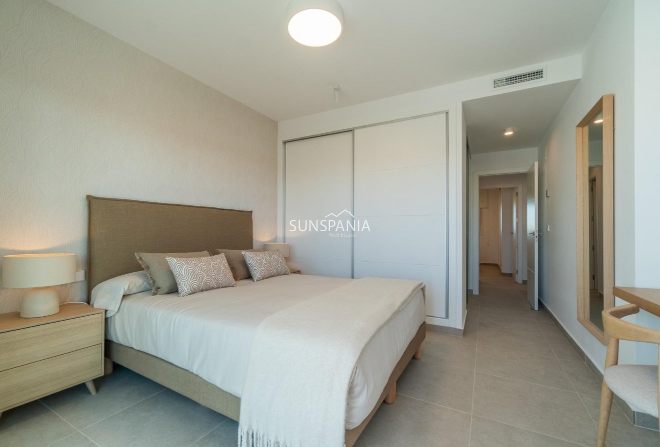 Obra nueva - Piso -
Orihuela Costa - Playa Flamenca