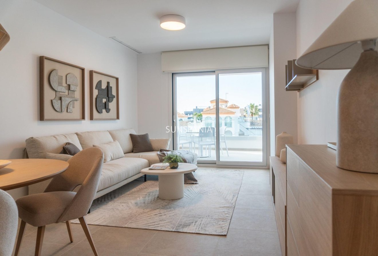 Obra nueva - Piso -
Orihuela Costa - Playa Flamenca