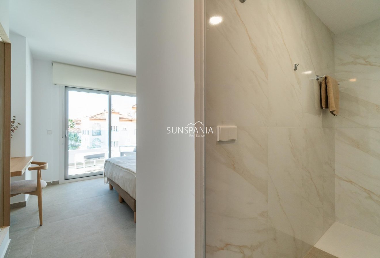 Obra nueva - Piso -
Orihuela Costa - Playa Flamenca