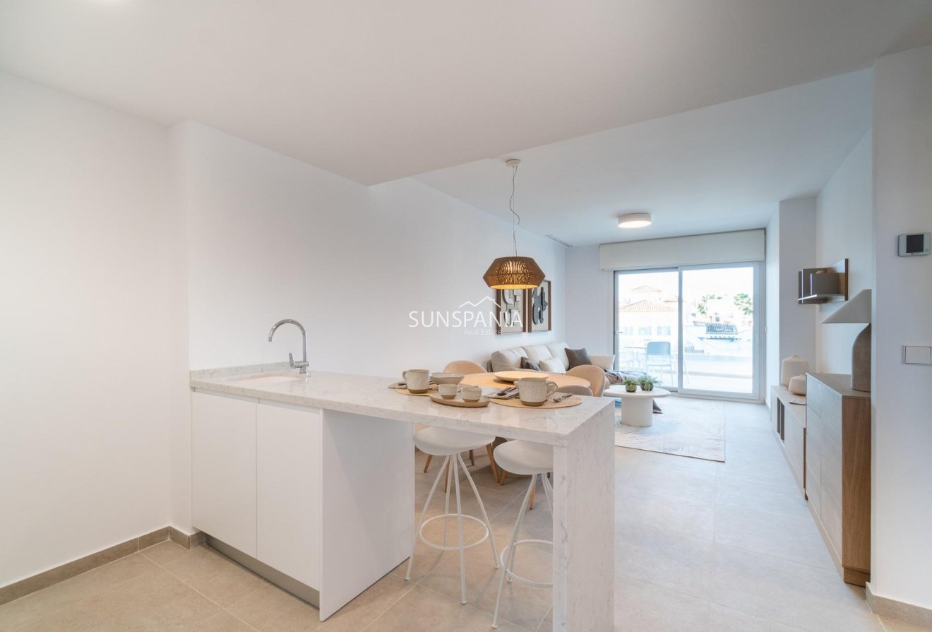 Obra nueva - Piso -
Orihuela Costa - Playa Flamenca