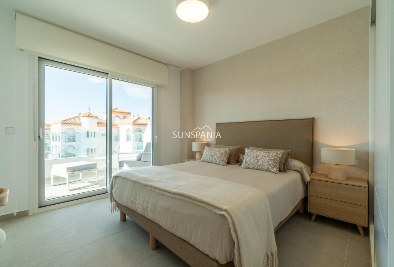 Obra nueva - Piso -
Orihuela Costa - Playa Flamenca